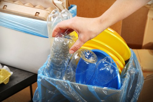 Workers sorting construction waste for recycling